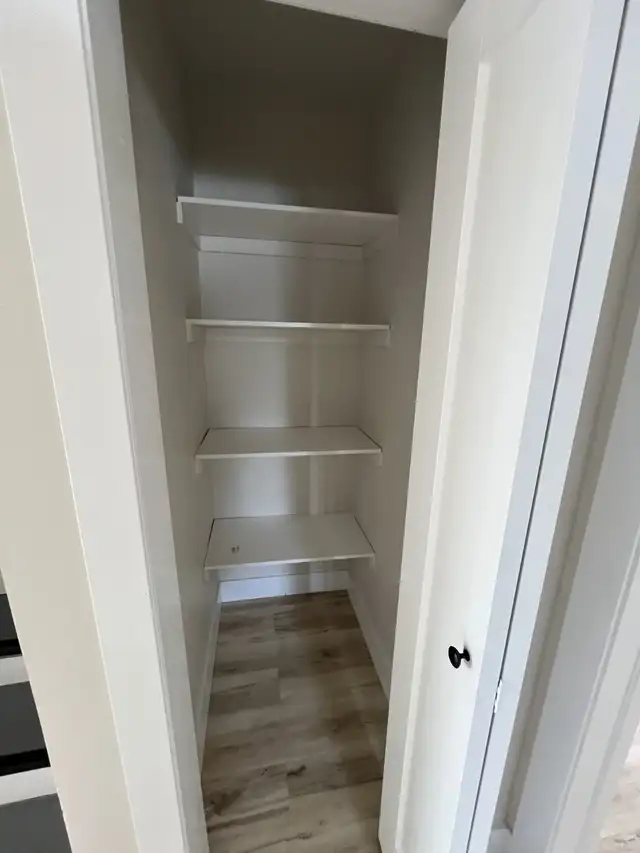 Newly Renovated 2 Bedroom   Den Basement Unit - Photo 7