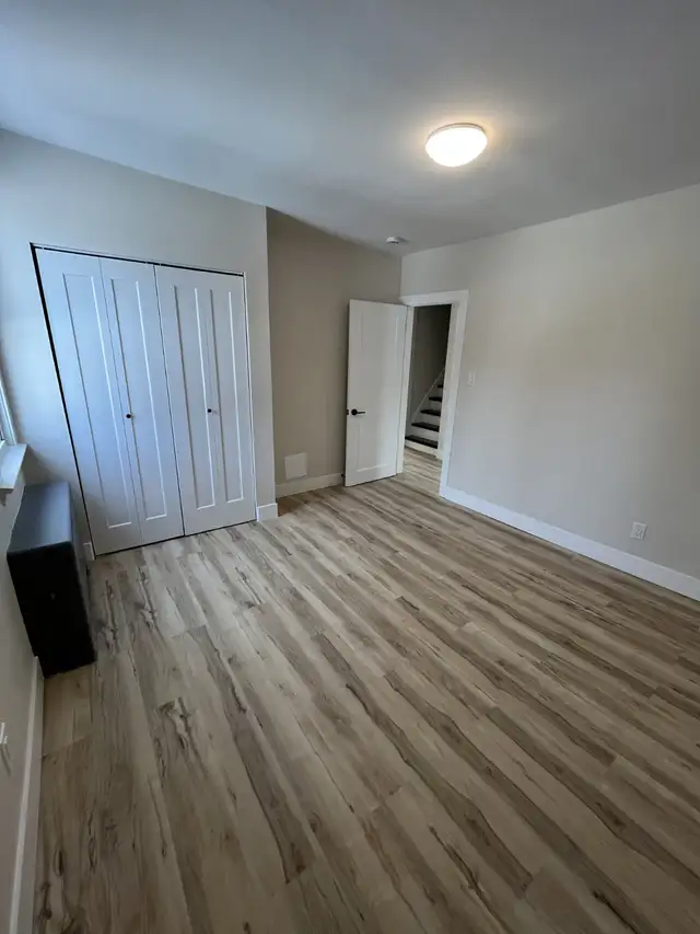 Newly Renovated 2 Bedroom   Den Basement Unit - Photo 9