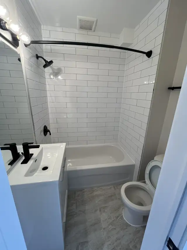 Newly Renovated 2 Bedroom   Den Basement Unit - Photo 12