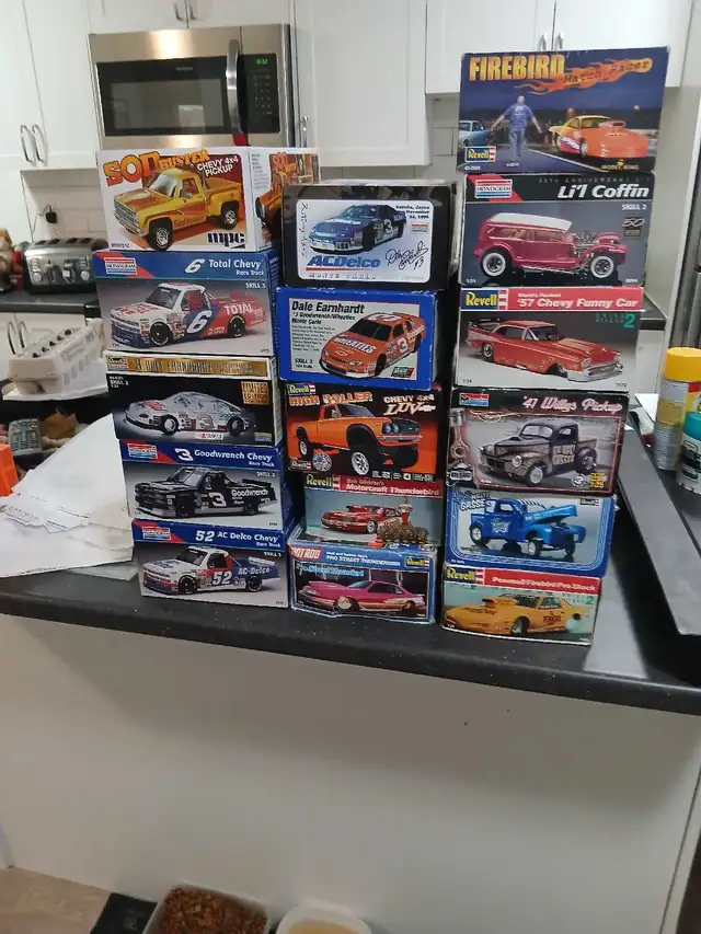 mixture of plast model cars and truck plus nascars and trucks