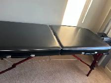 Massage table