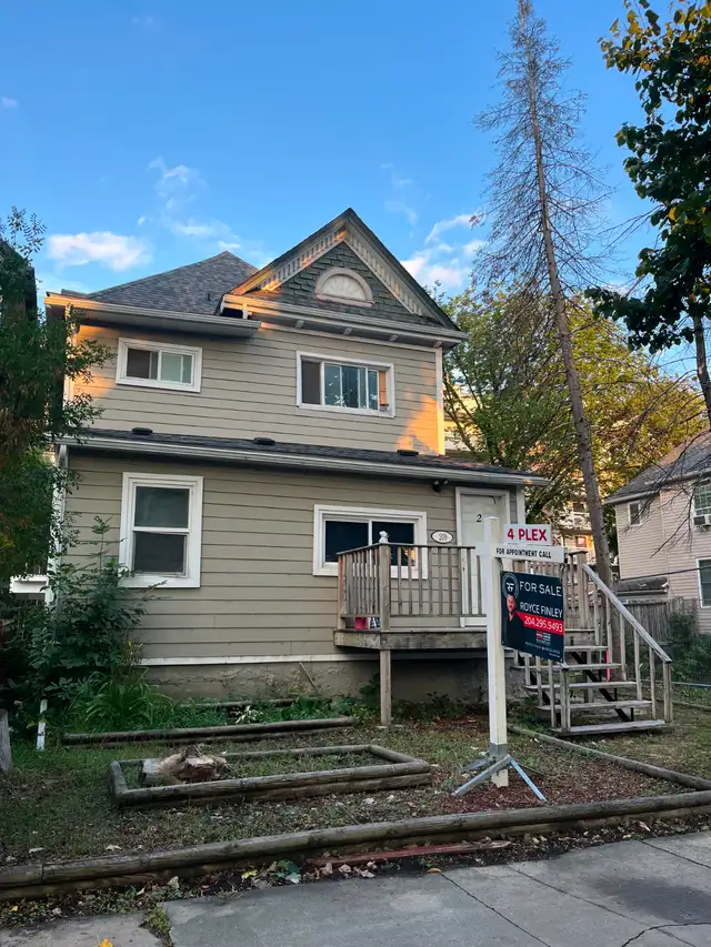 Solid 4-Plex w/ plenty of upgrades! Walking distance to U of W!