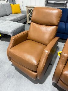 Tan leather swivel pushback recliner
