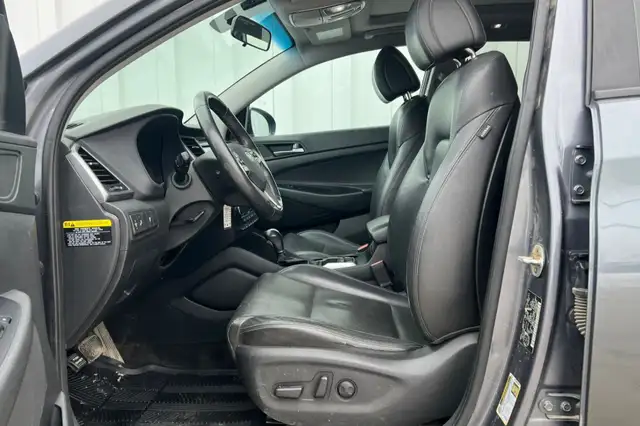 2017 Hyundai Tucson AWD 4dr 1.6L SE - Photo 11