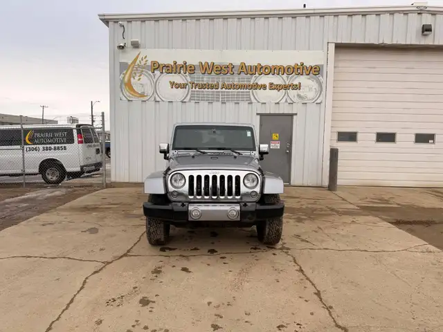 2016 Jeep WRANGLER UNLIMITED 4WD 4dr Sahara - Photo 2