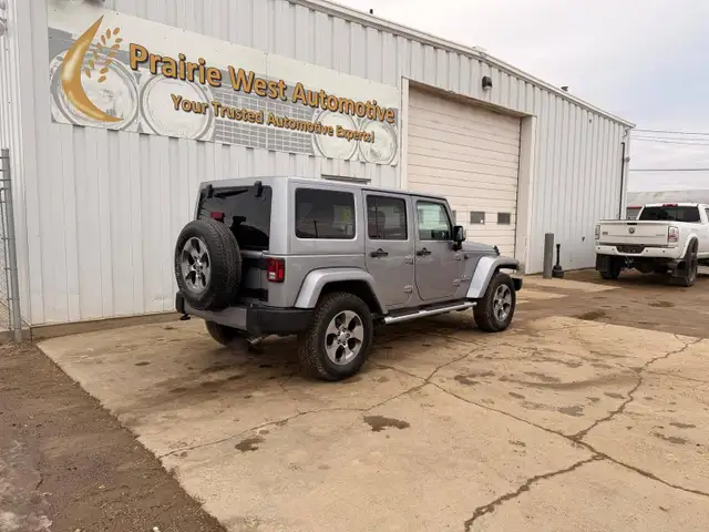 2016 Jeep WRANGLER UNLIMITED 4WD 4dr Sahara - Photo 4
