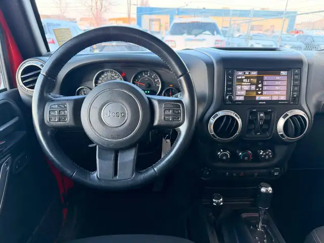 2017 Jeep WRANGLER UNLIMITED 4WD 4dr Sahara - Photo 11