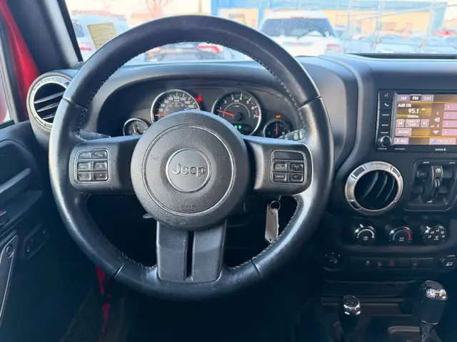 2017 Jeep WRANGLER UNLIMITED 4WD 4dr Sahara - Photo 12