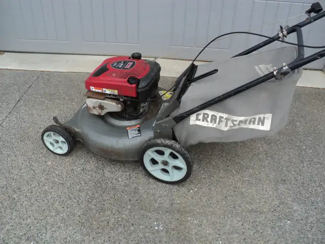 6.75 HP Briggs & Stratton w/ BAG & HIGH REAR WHEELS (Calls Only)