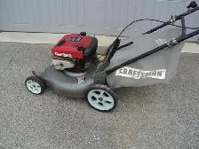 6.75 HP Briggs & Stratton w/ BAG & HIGH REAR WHEELS (Calls Only)