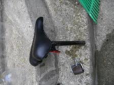 brand new bike seat with reflector and shaft