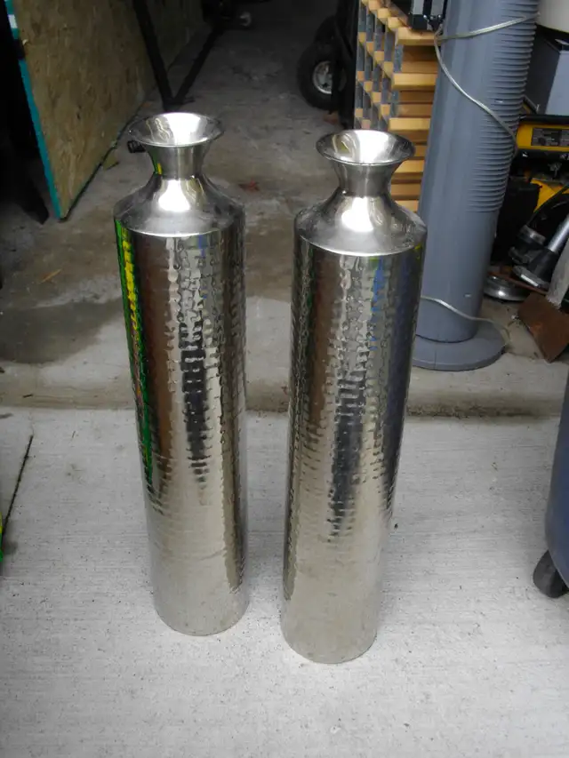 2 stainless vases