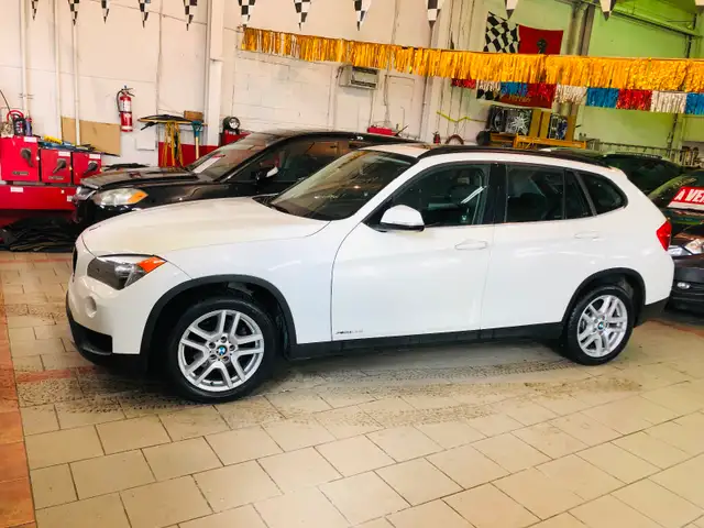 2014 BMW x1 AWD 28i ECO/ 98,000 KM/ TOIT PANO/ COMME NEUVE/ UN V