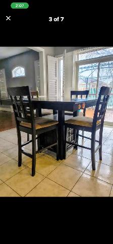 Free delivery used Dark Wood Counter Height Table with 4 Chairs
