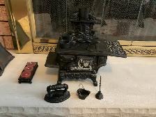 ANTIQUE BLACK CAST IRON CRESCENT DECOR STOVE WITH BONUS