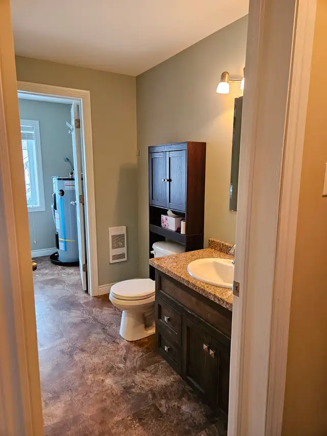 2‑Bedroom Basement Apartment Available Now - Photo 5