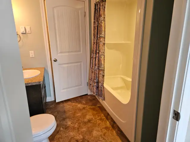 2‑Bedroom Basement Apartment Available Now - Photo 7