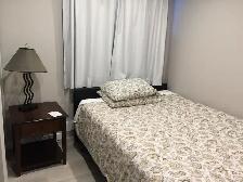 2 legal bedroom fully furnished in workout basement - Photo 8