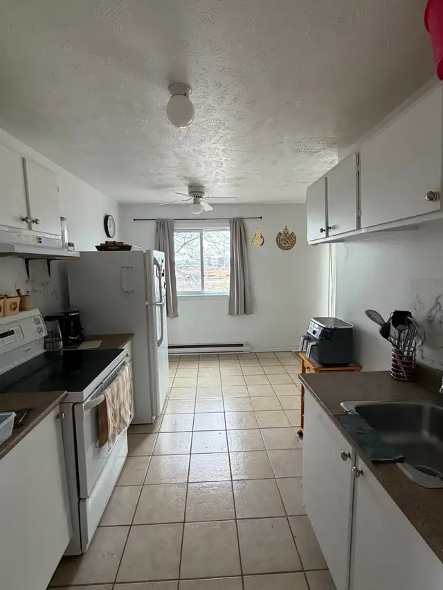 ''NOUVEAUX'' UN 4½ POUR 1 JUILLET DERNIER ÉTAGE D'UN 24 LOGEMENT - Photo 6