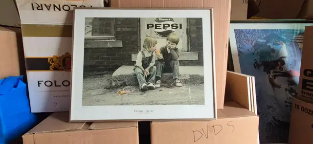 2 Pepsi pictures boy and eating ice cream...