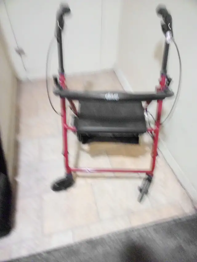 Medical walker with brakes and storage seat