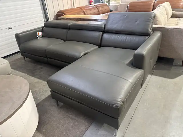 Grey leather sectional with power seat
