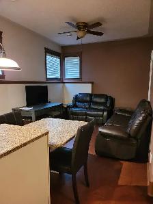 Basement suite & attached heated garage Ready to move-in - Photo 2