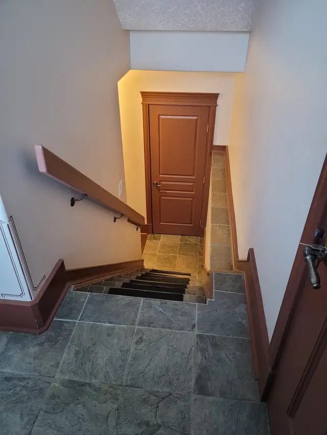 Basement suite & attached heated garage Ready to move-in - Photo 9