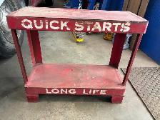vintage gas station battery stand