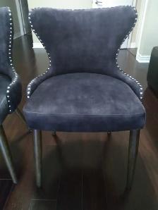 Solid wood dining table with two upholstered grey chairs - Photo 3