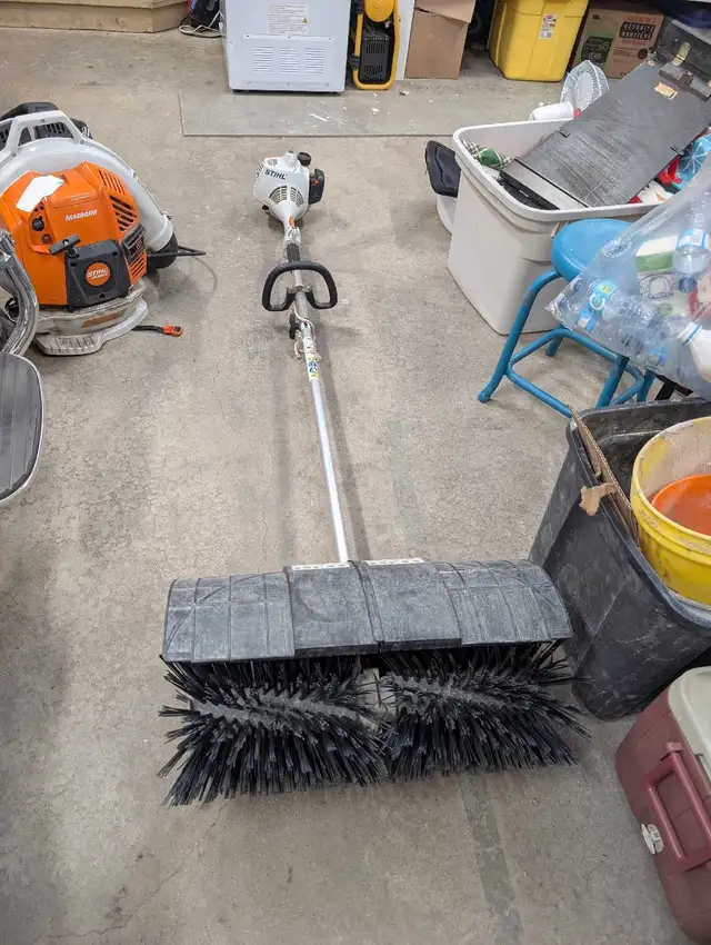 Stihl Kombisystem power head with brush attachment