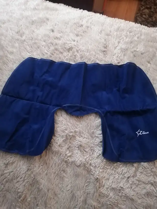 Neck pillow blows up blue suede