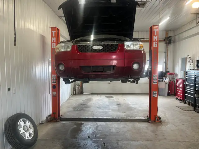 Fully operational to post 10,000 pound vehicle lift