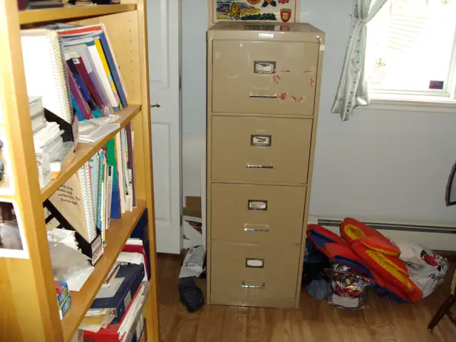 Used 4 door metal filing cabinet