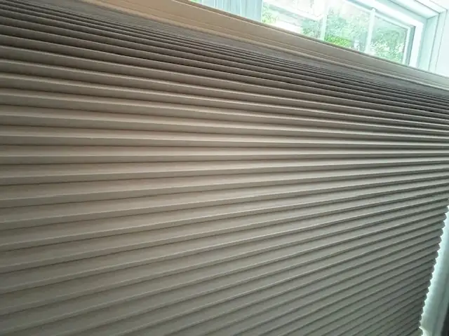 2 PLEATED BLINDS  SIZE AND DESCRIPTION ON AD.