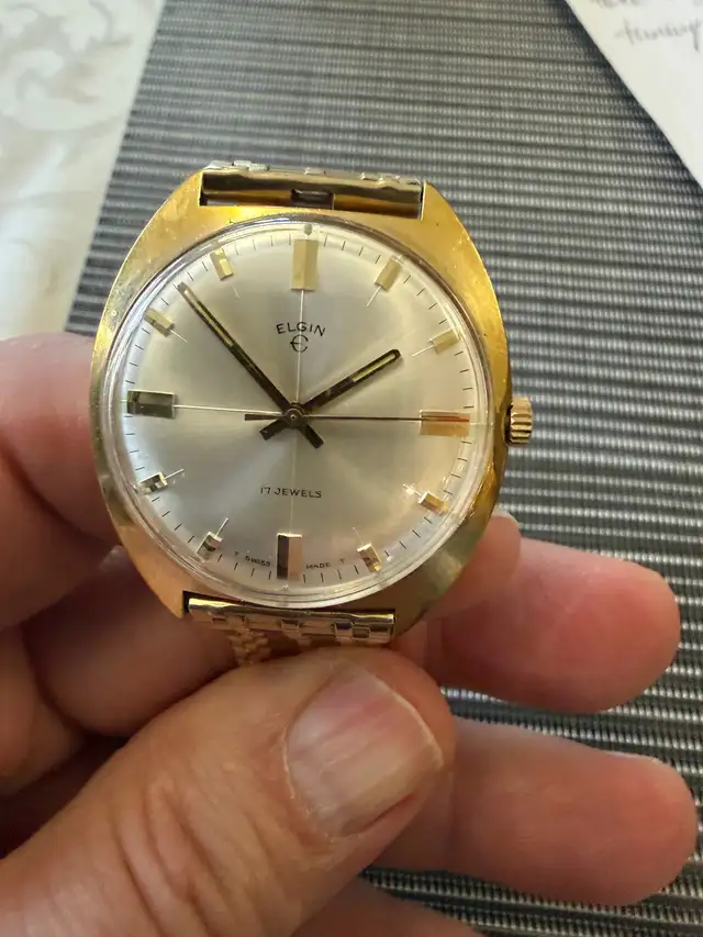 Elgin men’s Swiss made gold band watch