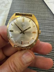 Elgin men’s Swiss made gold band watch