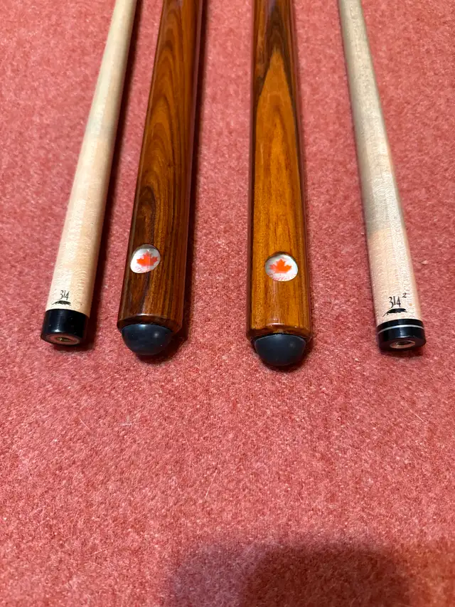 Dufferin pool cues with Predator 314 shafts.