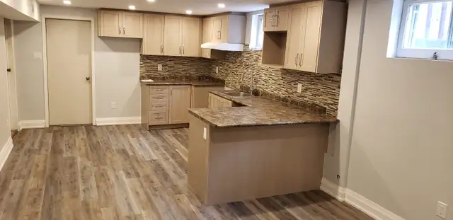 Fully renovated, legal 2‑bedroom basement apartment for rent - Photo 2