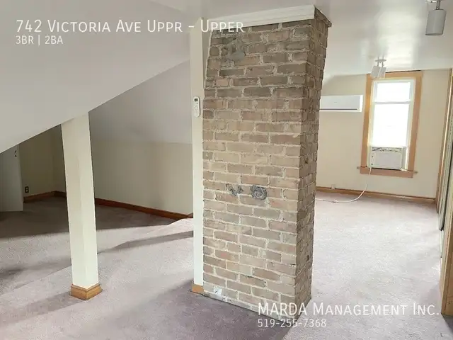 COZY 3 BED/2 BATH VICTORIAN UPPER UNIT W/ LOFT   HYDRO & 60% GAS - Photo 5