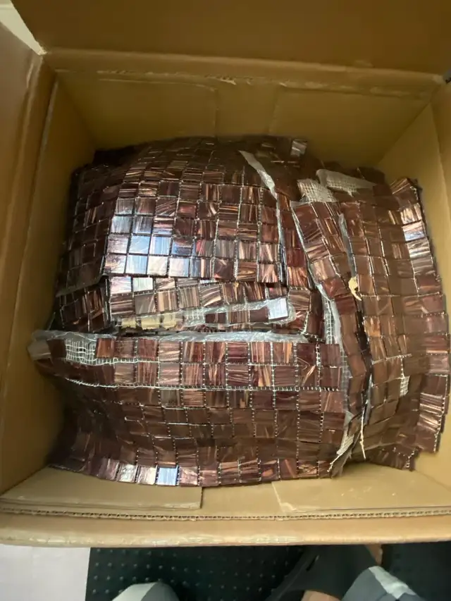 Brown backsplash never use in box weighs approximately 75 lbs