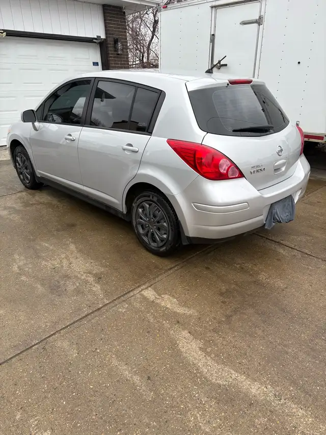 2009 nissian versa - Photo 3