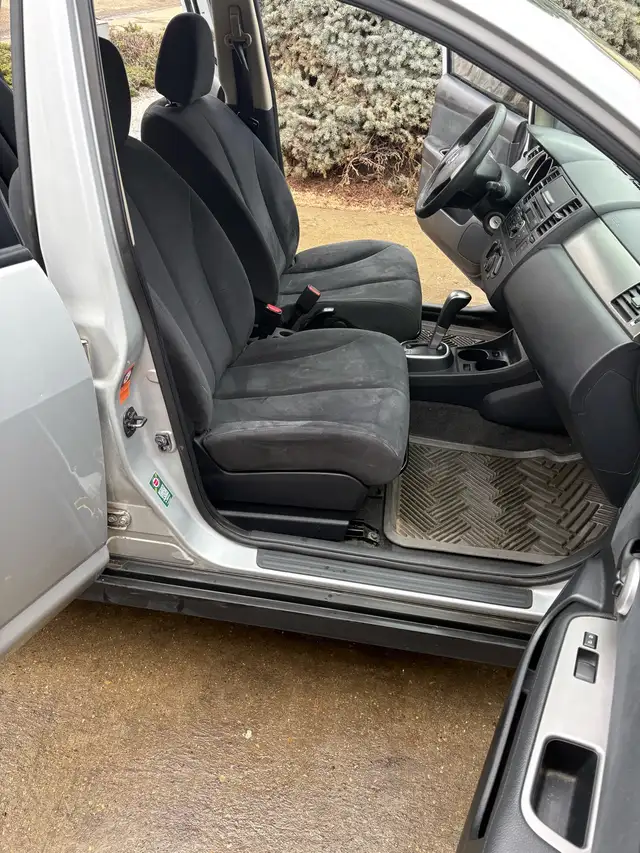 2009 nissian versa - Photo 9