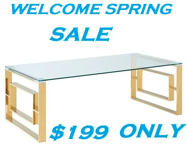 EROS COFFEE TABLE IN POLISHED GOLD AND THICK GLASS..