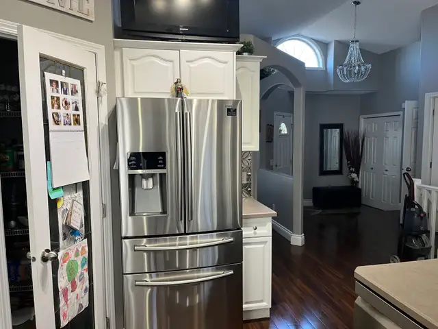 Kitchen cabinets and island - Photo 2