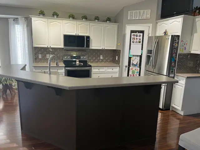 Kitchen cabinets and island - Photo 4