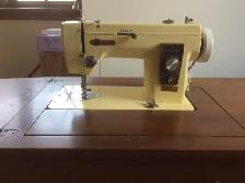 sewing machine with cabinet