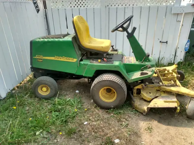 assorted lawn tractors stripped for parts