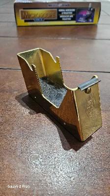 Distribiteur de ruban adhésif finition en or (marque El Casco)