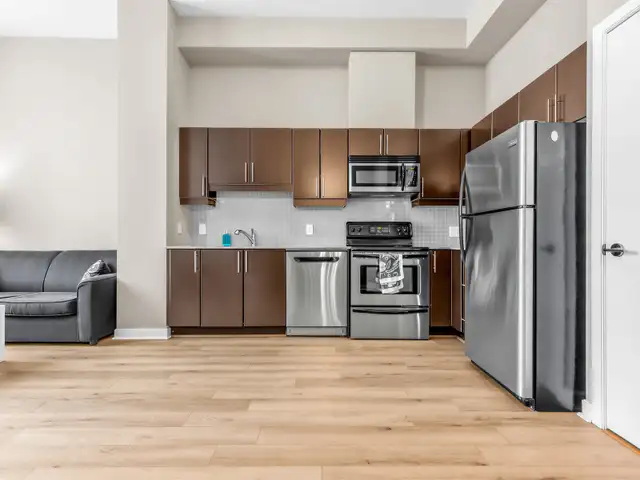1 Den Loft-style unit available for immediate occupancy! - Photo 2
